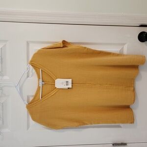 Mustard colored shirt